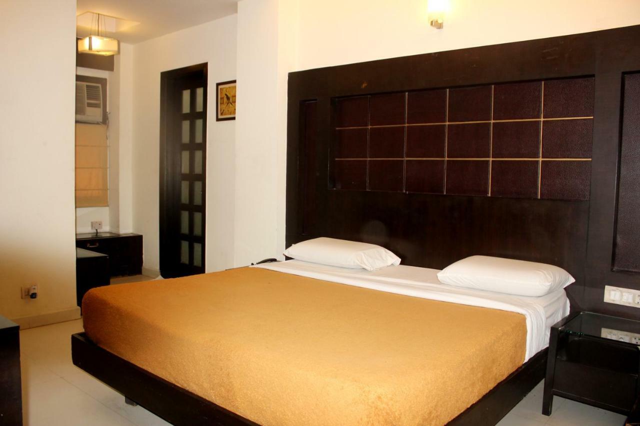 Hotel Aman Deluxe Nueva Delhi Exterior foto